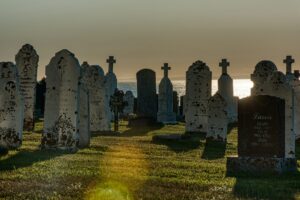 Before you is a cemetery, or perhaps simply a collection of gravestones overlooking a lake. Buried here are all your favourite characters. Their authors probably did this on purpose, to torment you.